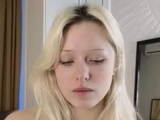 Close up with teen blonde sex doll rubbing her cunt