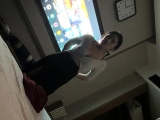 Cute amateur asian web cam girl playing with her toy